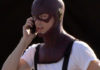 THE FLASH : Grant Gustin wearing suspenders on the set