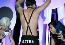 SEXY : Tyler Posey strips down on stage