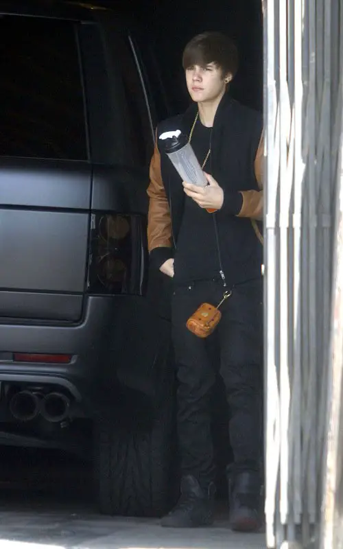 justin-bieber-HM-Navy-and-Brown-Sleeve-Varsity-Jacket-mcm-keychain-wallet-pouch-1