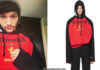 STYLE : Louis Tomlinson wearing a Red & Black Champion Edition Antwerpen Hoodie