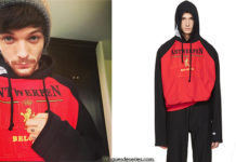 STYLE : Louis Tomlinson wearing a Red & Black Champion Edition Antwerpen Hoodie